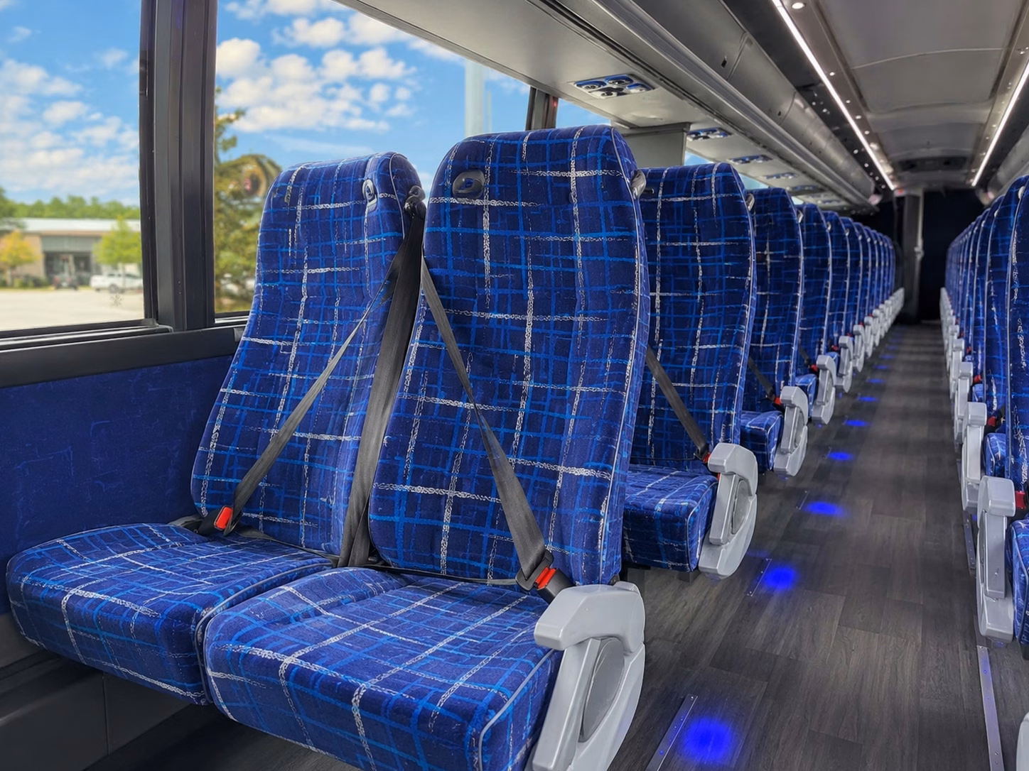 how trip distance and duration affect charter bus rental rates in newark